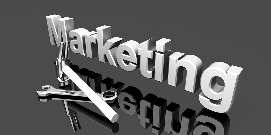 great marketing copy in 5 easy steps for small business - image of metallic word marketing with tools